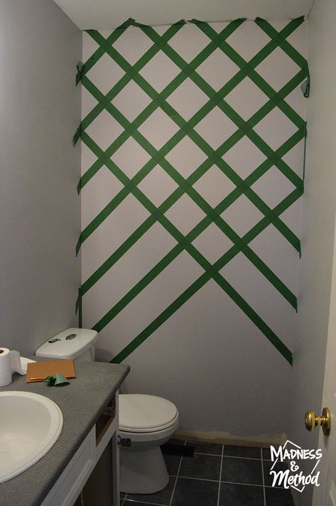 By using the width of painter's tape as our guides, it was actually super quick to tape up the diamond accent wall and get the pattern we wanted. Just remember to paint in the same direction each time to avoid extra seepage... Painters Tape Design Wall, Diamond Accent Wall, Painters Tape Design, Geometric Wall Paint, Wall Paint Patterns, Tape Wall, Diy Wall Painting, Tape Painting, Accent Wall Paint