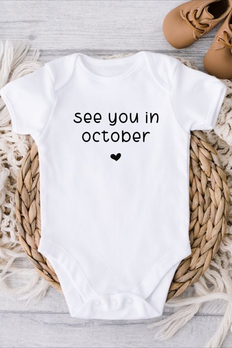 Surprise your husband with True Blue Baby Co's "See You in October" onesie! This onesie features a message that expresses your joy and anticipation for your little one's arrival. It's the perfect way to share your news with your partner and make your pregnancy journey even more special. Order yours today and let the countdown to October begin! #pregnancyannouncementtohusband #seeyouinoctoberonesie #babyonesies #surpriseannouncement #SeeYouInOctober #SurpriseAnnouncement
#TrueBlueBabyCo Onesie Ideas Announcement, Pregnancy Announcement October 2024, October Baby Announcement 2024, Baby Onsies Ideas Announcement, Baby Onesies Announcement, October Baby Announcement, Baby Onesie Announcement, Gender Reveal Onesie, October Pregnancy Announcement