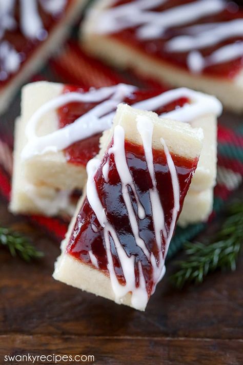 Ribbon cookies filled with jam and glazed in icing. A cookie standing up right on a wooden platter. Chicken And Pineapple Skewers, Ribbon Cookies, Pillsbury Cookie Dough, Best Cookie Recipe Ever, Dusting Tips, American Dessert, Easy Bar Recipes, Lemon Drop Cookies, Best Holiday Cookies