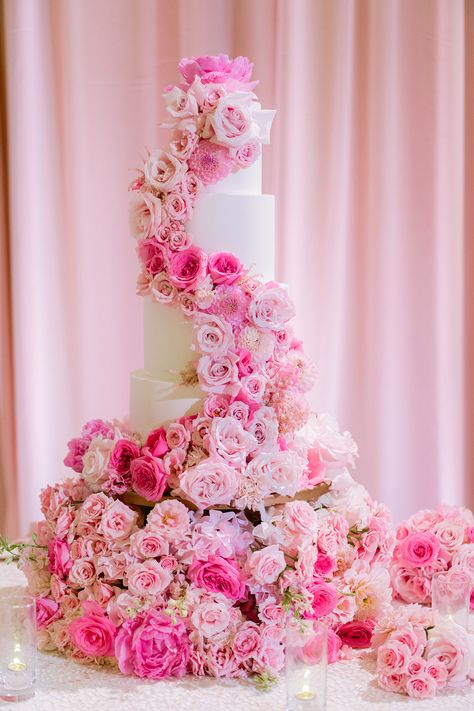 White fondant wedding cake with cascading pink roses. Photographed by @sanazriggiophotography #weddingcakeswithflowers #pinkweddingcakes Cascading Flower Cake, White Fondant Wedding Cake, Pink Drapery, White Flower Cake, Flower Cake Decorations, White Fondant, Fondant Wedding Cakes, Cascading Flowers, Pink Wedding Cake