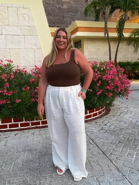 Plus size beach resort outfit 🏖 the white linen pants from eloquii run true to size, or size down if in between sizes. You can save 50% off on the wide leg linen pants right now, too! The brown bodysuit from old navy also runs true to size and I would size down if in between sizes. I paired the outfit with my birks for the sake of packing light, but the outfit would look great with a heel or nicer sandal too! #LTKsalealert #LTKcurves #LTKunder100 Linen Pants Outfit Plus Size, Brown Linen Pants Outfit, Plus Size Linen Pants Outfit, Wide Leg Linen Pants Outfit, White Pants Outfit Summer, Vacation Plus Size, White Linen Pants Outfit, Wide Linen Pants, Brown Linen Pants