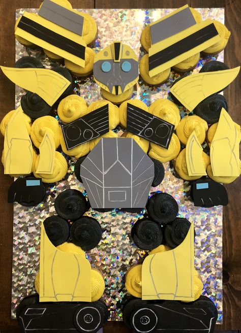 Bumblebee Transformer birthday cupcake cake Transformers Birthday Cupcake Cake, Bumble Bee Cupcakes Transformers, Bumblebee Cupcakes Transformers, Bumblebee Birthday Party Transformers, Trans4mer Birthday, Bumblebee Transformers Cake, Transformer Cupcakes, Bumble Bee Transformer Cake, Bumble Bee Transformer