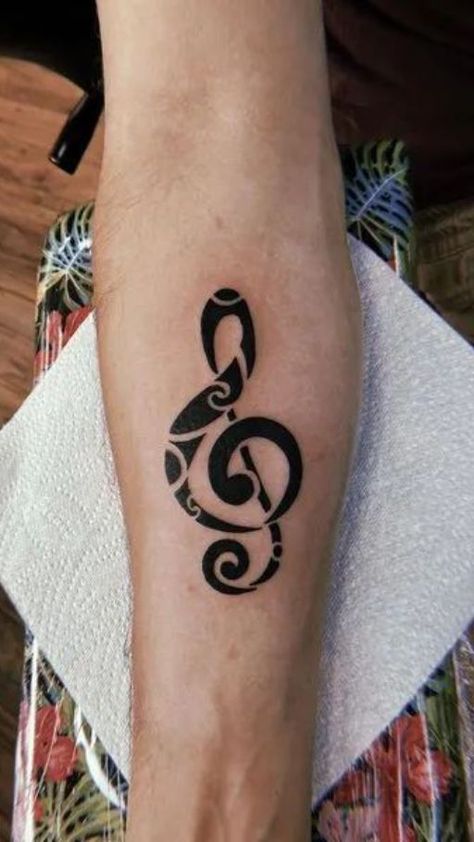 Harmony in Ink: Music notes tattoo ideas. Explore designs that capture the rhythm and melody of your favorite tunes in a timeless and artistic symphony. Music Tattoo Ideas For Men, Music Note Tattoo Ideas, Music Staff Tattoo, Music Sign Tattoo, Music Symbol Tattoo, Music Lover Tattoo, Notes Tattoo, Music Tattoo Ideas, Religion Tattoos