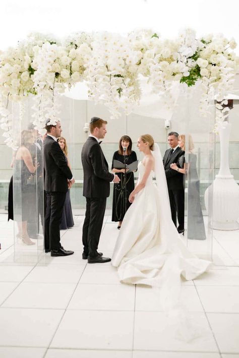 25+ Modern Monochromatic Wedding Florals & Decor Ideas • VintageBash Orchid Chuppah, Chuppah Flowers, Monochromatic Wedding, Wedding Chuppah, Catholic Wedding Ceremony, Rose Floral Arrangements, All White Wedding, Themed Wedding Cakes, Orchid Wedding