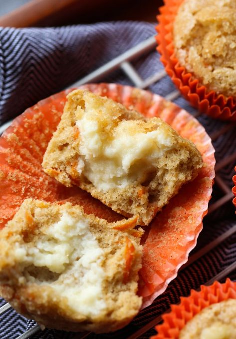 Inside Out Carrot Cake Muffins are soft, sweet carrot muffins, spiced with cinnamon, topped with crunchy sugar, and filled with delicious cream cheese frosting that peeks out the top when they're baked. #cookiesandcups #carrotcakemuffins #carrotmuffins #easter #muffins Easter Muffins, Cinnamon Glaze Recipe, Cream Cheese Filled Cupcakes, Vegan Carrot Cake Muffins, Carrot Cake Muffin Recipe, Healthy Carrot Cake Muffins, Healthy Carrot Cake, Muffin Flavors, Cinnamon Glaze