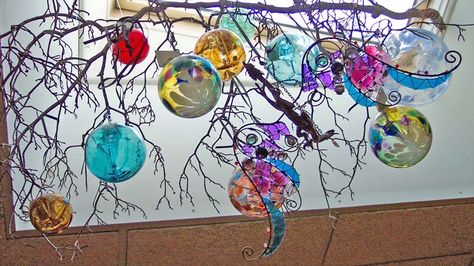 Both Bottle Trees and Witch Balls are made up of glass, which often seems to get overlooked as a magical tool. Description from laurendevoe.com. I searched for this on bing.com/images Glass Balls Display, Witch Balls, Witch Ball, Celtic Myth, Bottle Trees, Bottle Tree, Glass Floats, Gazing Ball, Reading Pa