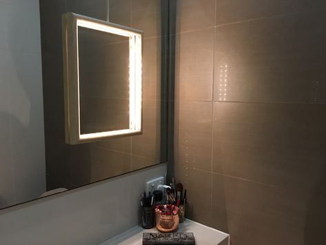 The house we're renting has a poorly lit bathroom vanity mirror. My idea was to use a picture frame filled with LED lights and hung from the mirror. Diy Vanity Mirror With Lights, Ikea Bathroom Vanity, Ikea Picture Frame, Light Up Vanity, Diy Vanity Mirror, Cottage Style Bathrooms, Ikea Pictures, Ikea Bathroom, Lighted Vanity Mirror