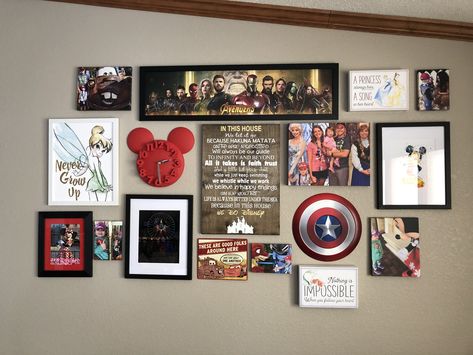 Disney wall decor of our favorites! Disney Wall Collage, Disney Gallery Wall Ideas, Nerdy Wall Decor, Disney Wall Decor Ideas, Disney Movie Room, Movie Gallery Wall, Disney Gallery Wall, Disney Living Room, Nerdy Bedroom