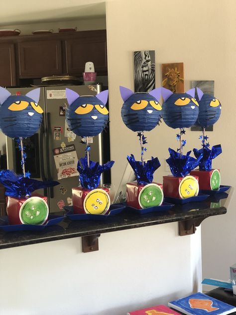 Pete the Cat inspired centerpieces Pete The Cat Bday Party, Coraline Party Centerpieces, Pete The Cat Graduation Theme, Pete The Cat Birthday Party Decor, Pete The Cat Party Decorations, Coraline Birthday Party Ideas Diy, Coraline Centerpieces, Pete The Cat Decorations, Pete The Cat Birthday Party Ideas