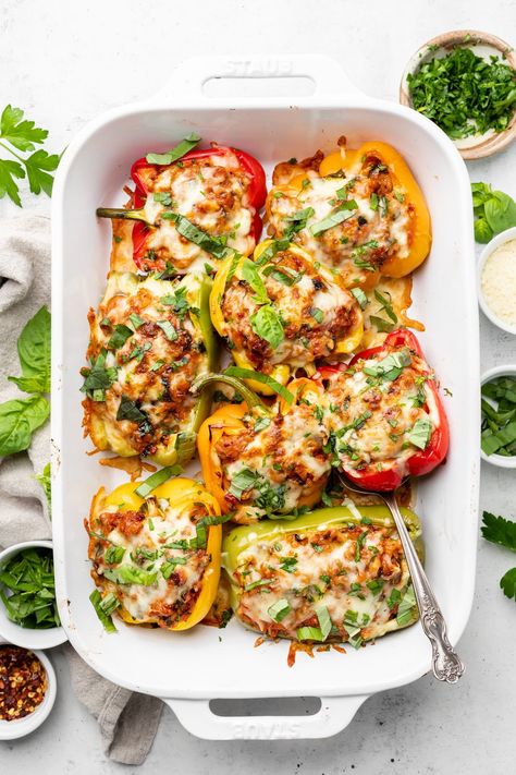 These Ground Turkey Stuffed Peppers are easy to make and filled with a hearty mixture of lean ground turkey, brown rice, and cheese! Turkey And Rice Stuffed Bell Peppers, Ground Turkey Stuffed Peppers No Rice, Turkey Quinoa Stuffed Peppers, Stuffed Peppers Quinoa Turkey, Stuffed Bell Peppers Turkey, Stuffed Bell Peppers Turkey Quinoa, Healthy Stuffed Bell Peppers Turkey Cauliflower Rice, Ground Turkey Rice, Turkey Stuffed Peppers