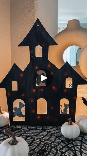 7 comments | What do you think of my Spooky Lit Haunted House!? 👻 SAVE this video to create your own spooky decor on a budget! 🦇  When I saw this haunted house cardboard cut out at @dollartree , I knew instantly that I needed to create some kind of spooky Halloween decor prop with it! 🦇  It turned out even better than I pictured in my mind, but I still feel like it’s missing something! Would you add or change anything? Let me know…  SEND this to your ghoul friends! 💌 Then follow @heyitserintay for more seasonal DIY Halloween decor ideas 🎃 • • • • • #hauntedhouse #diyhauntedhouse #halloween #diyhomedecor #dollartree #dollartreefinds #dollartreehaul #dollartreeshopping #dollartreeaddict #dollartreeobsessed #dollartreecommunity #dollartreehomedecor #homedecor #homedecoronabudget #budgeth Diy Halloween Decorations Cardboard, Halloween Decorations Cardboard, Cardboard Haunted House Diy, Dollar Tree Haunted House Cutout, Diy Haunted House Silhouette, Cardboard Halloween Decorations Diy, Dollar Tree Haunted House, Wood Haunted House Craft, Wooden Haunted House