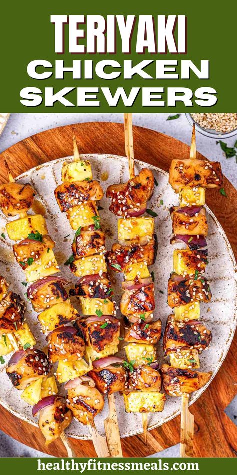 Teriyaki Chicken Skewers are incredibly tender, grilled to perfection, and coated with a sweet and tangy sauce made of coconut aminos, honey, sesame oil, garlic, ginger, and cayenne pepper. The marinated chicken is stacked with pineapple and red onion for the perfect blending of flavors. Great for BBQs! This grilled teriyaki chicken skewers recipe with a flavorful marinade is a great addition to your next barbecue, holiday celebration, party, or just an everyday healthy dinner. Teriyaki Chicken Skewers Grilled, Honey Sriracha Chicken Skewers, Grilled Teriyaki Chicken Thighs, Asian Chicken Skewers Grilled, Chicken And Veggie Skewers Grilled, Teriyaki Chicken Skewers, Grilled Teriyaki Chicken, Chicken Skewer Recipe, Amazing Chicken