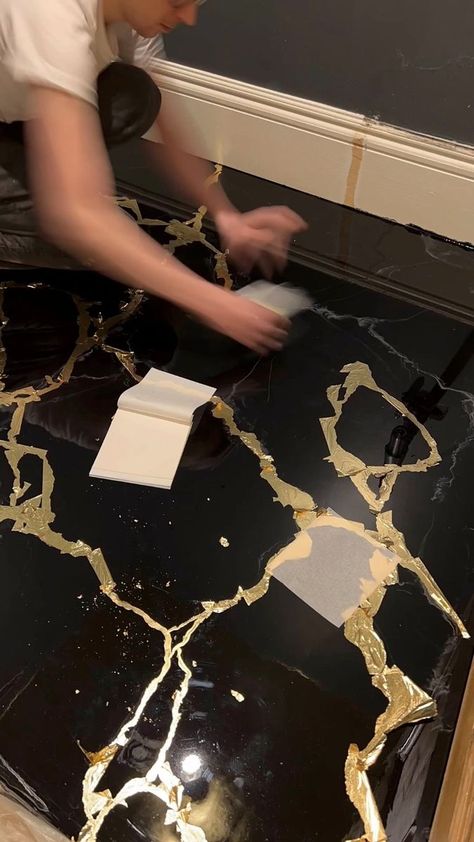 Black marble resin floor with gilded veining ✨ _________________#blanddesign #resinfloor #epoxyfloor #blackmarble #blackbathroom #resinart #ukartist #gold #goldleaf #goldceiling #gilding #gildedceiling #goldleafceiling #goldbath #goldbathroom #golddecor #maximalistdecor #apartmenttherapy #satisfyingvideos #viralreels #relaxingart #mastercraft #restoration #luxuryinterior #specialistdecoration #bathroominspo #bathroomgoals #bathroomideas #funinteriors | Bland Design | Bland Design · Original aud Gold Epoxy Floor, Resin Floor, Marble Resin, Instagram Bathroom, Floor Restoration, Black And Gold Marble, Gold Ceiling, Relaxing Art, Maximalist Decor