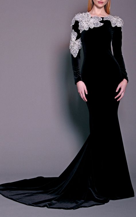 GABRIELLE'S AMAZING FANTASY CLOSET | Christian Siriano's Exquisite  Black Velvet Gown has Lacy White Floral, Crystal Embellished Appliqués across the Shoulders, Neckline and down One Sleeve. It has a Fit & Flare Silhouette with a High, Round Neckline, Long Sleeves and a Graceful Flare that sweeps to a Full Train. Dazzle with Diamond Cascade Earrings and a Pair of Rings. Black Velvet Sandals and a Lacy Jet Crystal Minaudière finish the look (It's all on this board) It's just Beautiful - Gabrielle Evermore Fashion, Winter Runway, Modern Royalty, Black Velvet Gown, Sleeved Velvet Dress, Pre Fall Fashion, Velvet Gown, Long Sleeve Gown, فستان سهرة