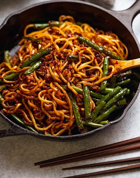 Spicy Sichuan Pork Noodles Recipe - PureWow Sichuan Pork, Green Bean Dishes, Kecap Manis, Pork Noodles, Asian Sauce, Recipetin Eats, Spring Dinner, Recipe Tin, Dinners To Make