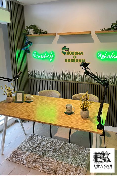 This stunning Studio was designed by Emma Kosh Interiors to host a female football themed Podcast.  The wallpaper was a hand drawn design specifically for this project. Neon lights were used to signpost insta handles.  All items needed to be 'removable' so vinyl wallpaper was used plus the panels were Velcroed to the wall. Podcast Wallpapers, Podcast Backdrop Ideas, Video Studio Setup, Podcast Setup Home, Podcast Setup Ideas, Video Podcast Studio Design Ideas, Podcast Studio Design Ideas, Podcast Decor, Podcast Set Design