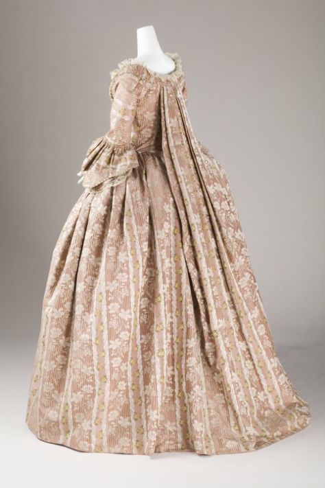 Rococo Fashion from 18th century ball gown dress Robe a la Francaise circa from 1760-1780. Sack Back Closed Robe #Historical #Costume made from silk with plain weave flower floral pattern, fabric gather as flounce decorated with woven braid trim and tulle lace on the matching stomacher bodice, sleeve and also on the skirt and the petticoat. #Vintage #Rococo #Fashion 18th Century Ball Gown, 1760s Fashion, 18th Century Dresses, 18th Century Gown, 1700 Fashion, 18th Century Dress, Rococo Fashion, 18th Century Costume, 18th Century Clothing