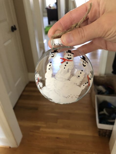 Handprint ornament craft with kids. Put glitter inside ornament as well. Handprint Christmas Ball Ornaments, Handprint Ornaments Ball, Hand Ornaments For Kids, Kids Clear Ornament Craft, Kids Handprint Ornaments, Clear Ornament Crafts For Kids, Clear Ornaments Diy Christmas, Clear Ornament Crafts, Ornament Handprint