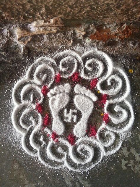 Laxmi padalu Rangoli Idea, Rangoli Dots, White Rangoli, Navratri Rangoli, Laxmi Maa, Dot Kolam, Rangoli Simple, Flowers Candles, Colorful Rangoli