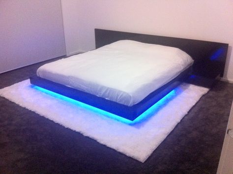 Custom built bed with led lights Floor Bed Design, Bed With Led Lights, Blue Led Lights, Floor Bed, Modern Floor, Room Idea, Bed Design, Custom Build, Led Light