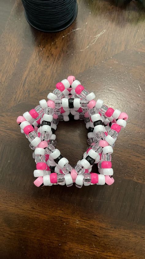 Star Kandi Cuff. Pink, Black, White, and Clear. Kandi Rotating Cuff Ideas, Epic Kandi Cuff, Kandi Star Cuff, Rotator Cuff Kandi, Kandi Flower Cuff, Scenecore Kandi, Kandi Bracelets Ideas, Kandi Patterns Cuff, Kandi Cuff Ideas