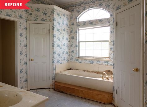 Before: Old bathroom with rusted tub and blue floral wallpaper Fixer Upper Welcome Home, Mid Century Renovation, Flip Ideas, Room Focal Point, House Flip, Transom Window, Relaxing Bathroom, White Tub, Wooden Vanity