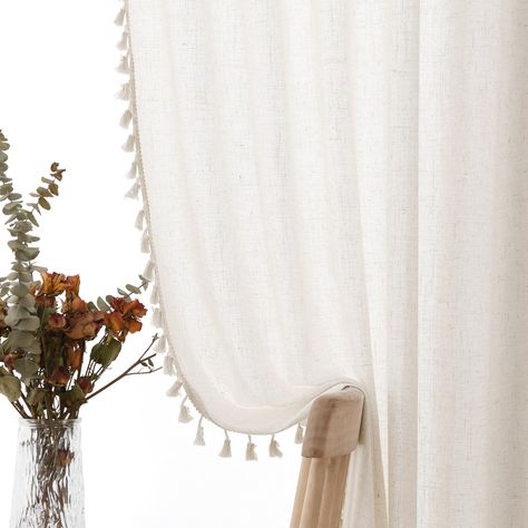 PRICES MAY VARY. Bohemian Farmhouse Style: The boho design bring a touch of tranquility and a distinctive bohemian aesthetic, creating a light, airy feel in spaces such as your living room, bedroom, nursery, laundry room, or any doorway Burlap Linen Texture: Our semi sheer boho curtains offer a rich texture and a rustic yet chic look. They are adorned with charming bohemian tassels, which lend an ethereal and soft-focus view to your window frames Light Filtering and Privacy: These tassel farmhou Boho Curtains Bedroom, Vintage Farmhouse Bedroom, Semi Sheer Curtains, Natural Curtains, Neutral Farmhouse, Bohemian Farmhouse, Tassel Curtains, Farmhouse Curtains, Short Curtains