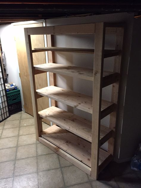 Pantry cabinet - requires about (20) 2x4x8, (3) 1x4x8, (2) 4x8 plywood, and 6 gate hinges. Cost for lumber and hinges is around $120 at Lowes. 2x4 Pantry, Diy Pantry Cabinet, Pallet Pantry, Diy Pantry Shelves, Diy Canning, Pantry Plans, Diy Cupboards, Pantry Shelves, Diy Pantry