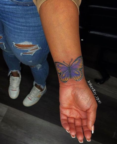 Butterfly Tattoo On Dark Skin, Tattoo On Dark Skin, Purple Butterfly Tattoo, Cute Foot Tattoos, Wrist Tattoo Cover Up, Butterfly Wrist Tattoo, Pretty Hand Tattoos, Hip Tattoos Women