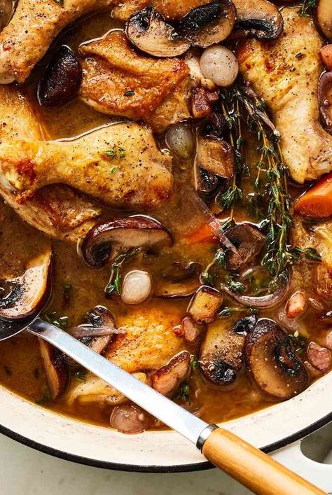 This deeply savory coq au vin recipe from Ina Garten is made with whole chicken cut into pieces, mushrooms, pearl onions, Cognac, and Burgundy. Coq Au Vin Recipe Ina Garten, French Chicken Recipes Coq Au Vin, Co Au Vin Chicken, Coc Au Vin Chicken, Cou Au Vin Chicken, Cog Au Vin Recipe, Chicken Gourmet Recipes, Cow Au Vin Recipe, Coq Au Vin Recipe Easy