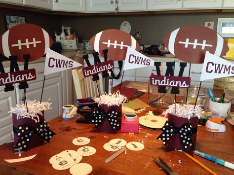 Football/basketball cheer/cheerleading decorations, centerpieces.  Awards, banquet or dinner.  Used soup cans covered in cardstock as base. Football Banquet Decorations, Cheerleading Decorations, Football Banquet Centerpieces, Cheer Birthday Party, Football Centerpieces, Soccer Banquet, Basketball Cheer, Themed Centerpieces, Banquet Centerpieces