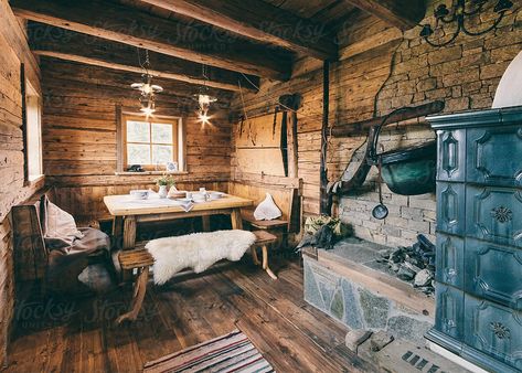 interior of a typical austrian wooden alpine cabin - livingroom by Leander Nardin for Stocksy United Log Cabin Kitchen Ideas, Cabin Livingroom, Cabin Style Living Room, Log Cabin Living Room, Alpine Cabin, Chalet Interior Design, Rustic Craftsman, Old Cabins, Log Cabin Living