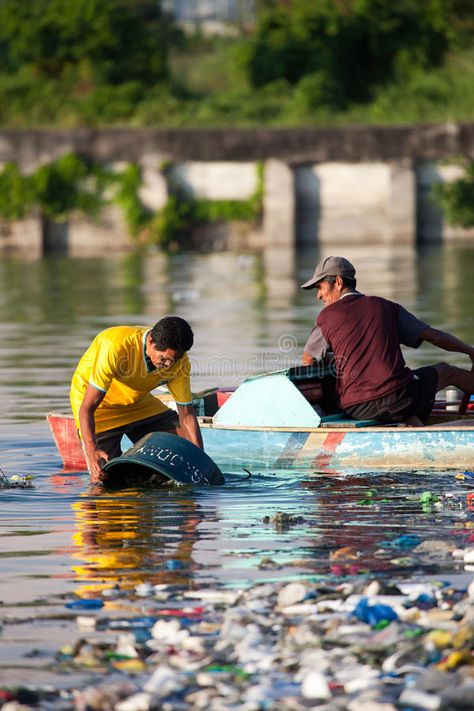 Man cleaning out his bucket in polluted river. February 10, 2011: Man cleaning o , #AFFILIATE, #river, #February, #polluted, #Man, #cleaning #ad River Clean Up, River Pollution Poster, River Editorial, River Pollution, Pollution Pictures, About Philippines, Man Cleaning, Water And Sanitation, Water Pollution