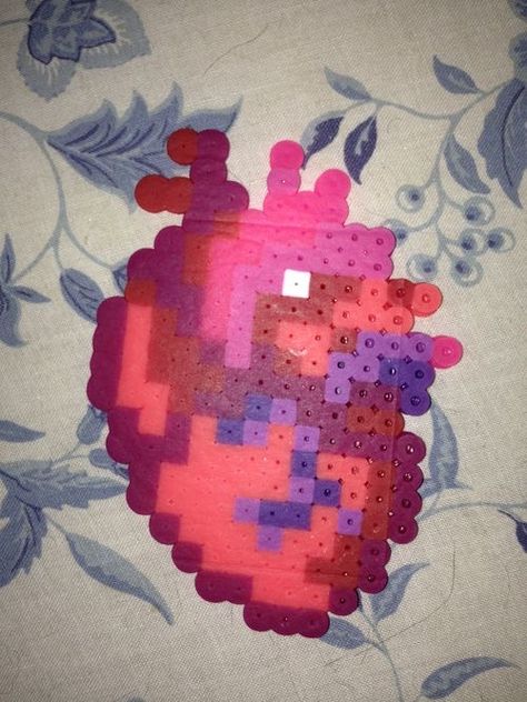 Perler Art Ideas, Perler Bead Heart Patterns, Howls Moving Castle Perler Bead, Aesthetic Perler Beads Ideas, Melanie Martinez Perler Beads, Heart Perler Bead Patterns, Pearler Beads Ideas Aesthetic, Heart Perler Beads, Perler Bead Heart