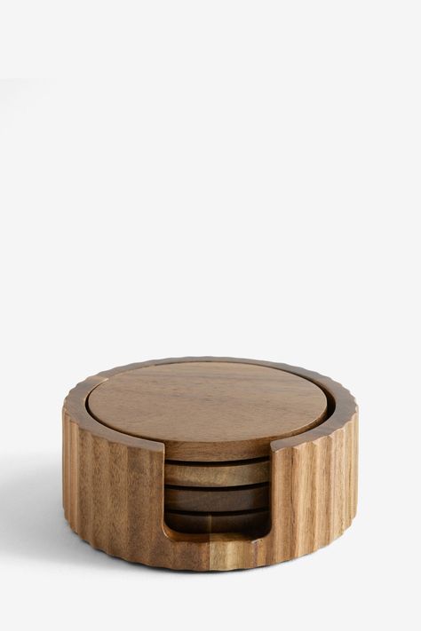 Elevate your living and dining spaces with this set of 4 round wooden coasters. The set comes with a matching wooden holder with a sleek ribbed edge texture, perfect for storing them neatly and making a striking centerpiece on your coffee or dining table. Co-ordinating placemats also available. Wipe clean only. 100% Wood. Wooden Placemats, Turning Projects, Wood Turning Projects, Small Wood Projects, Wooden Coasters, Wood Coasters, Wood Turning, Table Linens, Wood Projects