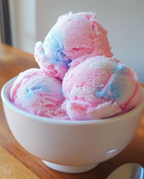 Cotton Candy Ice Cream 🍭🍦 Ingredients - 2 cups heavy cream - 1 cup whole milk - 3/4 cup granulated sugar - 1 teaspoon cotton candy extract - A few drops of pink food coloring (optional) - Cotton candy, for garnish Instructions 1. In a mixing bowl, whisk together heavy cream, whole milk, granulated sugar, cotton candy extract, and food coloring until the sugar is dissolved. 2. Pour the mixture into an ice cream maker and churn according to the manufacturer's instructions until it reaches a s... Slime Designs, Cotton Candy Aesthetic, Cotton Candy Ice Cream, Sherbet Ice Cream, Candy Ice Cream, Pink Food, Ice Cream Ingredients, Pink Food Coloring, Ice Cream Candy