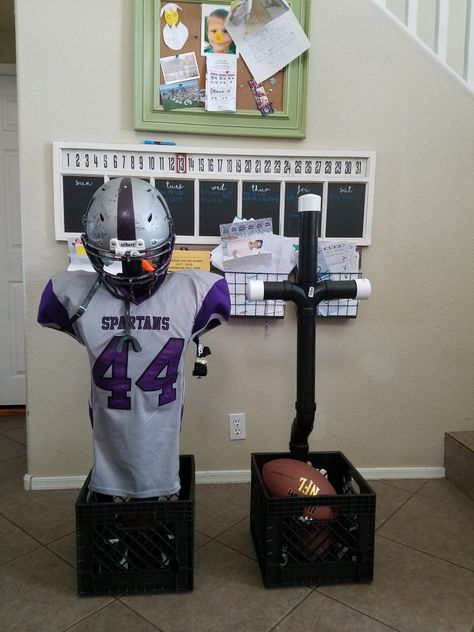 Football Equipment Storage Ideas, Organize Football Gear, Football Gear Stand Diy, Football Equipment Storage, Football Locker Room Uniform Storage, Football Helmet Display Ideas, Graduation Display, Football 101, Sports Equipment Storage