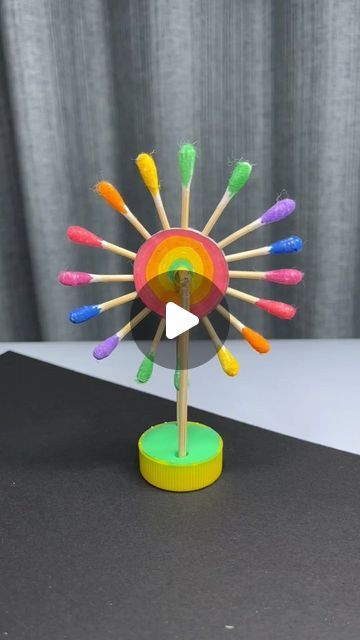 paper crafts creator on Instagram: "Use bottle caps and cotton swabs to make a nice-looking and fun Ferris wheel. Try it with your children #kindergartenhandmade #handmadediy #Let’s play with crafts #turnwasteintotreasure #parentchild #handwork 5-Minute Crafts Craft Home  paper craft  ideas" Art N Craft For Kindergarten, Diy Shop Ideas, Kids Activity At Home, Ferris Wheel Craft, Crafts With Popsicle Sticks, Home Activities For Kids, Kids Craft Work, Wheel Crafts, Activities For Kids At Home