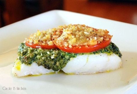 Roasted cod with basil pesto.    Just made and ate this and it rocks!  Super simple and easy to do.  We used our own pesto, small tasty tomatoes in slices, panko breadcrumbs, and then added a bit of grated parmesan on top.      I will definitely do this dish again!  Done in 15 minutes total! Pesto Cod Recipes, Pesto Cod, Lamb Cuts, Roasted Cod, Ezekiel Bread, Cod Recipes, Fish Recipe, Fish Dinner, Healthy Fish