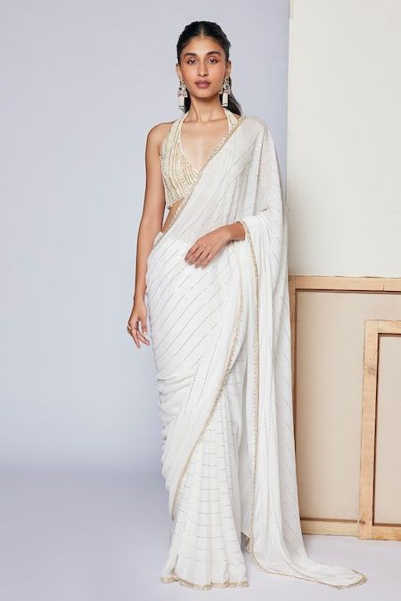 Buy White Saree Georgette Embellished Sequins Halter Ivy With Bralette For Women by Chamee and Palak Online at Aza Fashions. Diwali Outfit, Saree Hairstyles, Halter Neck Blouses, Saree Georgette, Silver Blouse, Diwali Outfits, Sequin Saree, Sequin Halter, White Saree