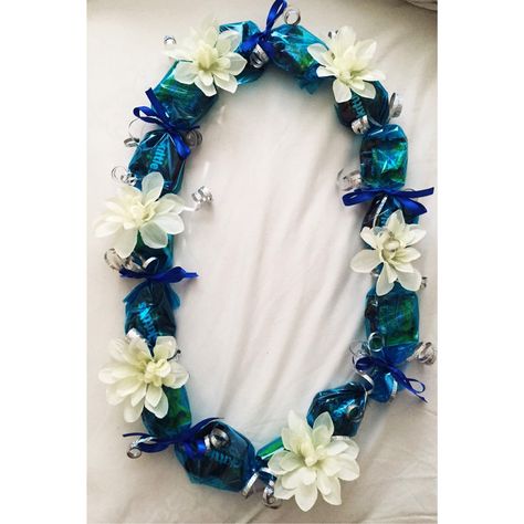 Blue Candy Lei with White Flowers by LindsaysLeis on Etsy https://www.etsy.com/listing/227972641/blue-candy-lei-with-white-flowers Candy Lace For Graduation, Diy Leis, Graduation Candy Lei, Grad Leis, Candy Leis, Money Lei Diy, Lei Ideas, Graduation Leis Diy, Graduation Money Lei