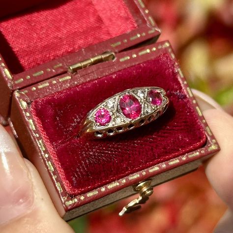 Friday Feature 💍 This ruby and diamond ring is a beautiful 1960s cluster ring made in the Victorian style with a trilogy of rubies across the front weighing approx. 0.62ct and 0.12ct and four twinkling diamonds nestled in between. The gallery on the ruby ring is all 18ct gold and complete with Chester hallmarks that date it to 1960. It’s in excellent condition and would make a wonderful 40th Ruby wedding anniversary gift. This stunning ruby ring is now available at an unbeatable 50% OFF! 🎉... Ruby Wedding Anniversary Gifts, Ruby Wedding Anniversary, Ruby And Diamond Ring, Ruby Wedding, Wedding Anniversary Gift, Ruby Ring, Victorian Style, Wedding Anniversary Gifts, Cluster Ring