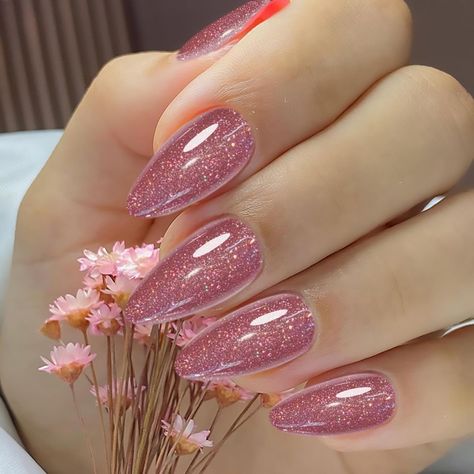 PRICES MAY VARY. 【SPARKLY GLITTER PRESS ON FALSE NAILS】Rimudecure light pink sparkly glitter press on fake nails have sparkling powder decorations that show different glitter effects in different lights, and there are multiple layers of protective nail polish to prevent the glitter from falling off and maintain a long-lasting sparkling shine,make your fake nails stand out. 【DURABLE AND LONG-LASTING】UV crystal coating prevents glitter from falling off, enhances translucent and bright effects, and Shine Pink Nails, Sparkling Pink Nails, Bright Sparkly Nails, Pink Theme Nails, Light Pink Hoco Nails, Pink Shine Nails, Baby Pink Glitter Nails, Light Pink Sparkly Nails, Sparkly Pink Nails