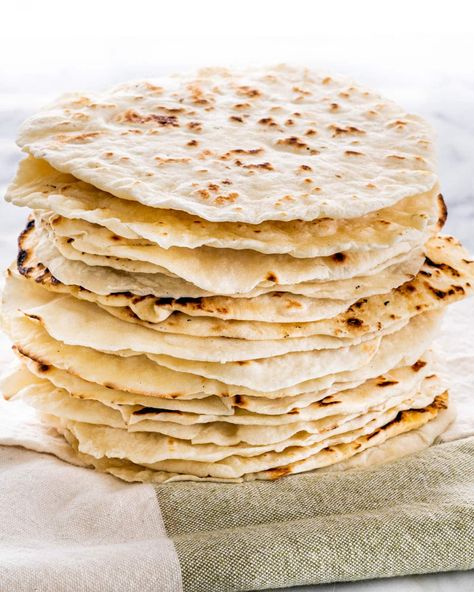 a stack of flour tortillas Taco Bar Menu, Tortillas Homemade, Gluten Free Flour Tortillas, Bluefields, Cauliflower Tortillas, Homemade Flour, Homemade Corn Tortillas, Homemade Flour Tortillas, Jo Cooks