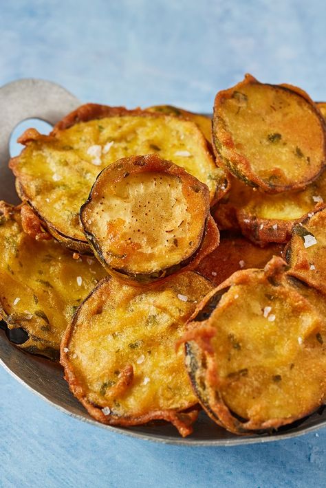 Beguni are a deliciously simple Bangladeshi fritter associated with monsoon season in the country. This recipe allows you to create the fried aubergine slices at home, made extra-crisp thanks to rice flour and spiced with cumin, chilli and turmeric. For more authentic Bangladeshi recipes, take a look at Dina's other recipes here. Fried Aubergine Recipe, Beguni Recipe, Aubergine Fritters, How To Freeze Asparagus, Bangladesh Recipes, Fried Aubergine, Freezing Asparagus, Bangladeshi Recipes, Aubergine Recipes