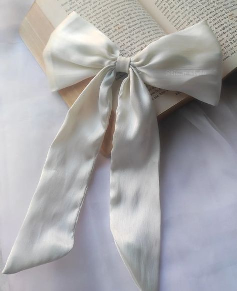 "Embrace Angelic Vibes with our White Satin Angelcore Bows. Discover ethereal elegance in every detail. #AngelcoreBows #HeavenlyChic" White Model Aesthetic, White Bow In Hair, White Bow Aesthetic, Angelic Vibes, Identity Moodboard, Aesthetic Angelcore, Bows Aesthetic, Ipad Picture, Bow Trend