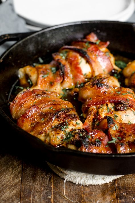 This smoky bacon wrapped chicken thigh recipe is always a crowd pleaser. Enjoy them with the sweet brown sugar topping broiled on top for a baked dinner that is easy and done quickly. The sweet and spicy baked chicken can also use breasts or tenderloins! #chicken #recipe #dinner #bacon Sweet And Spicy Baked Chicken, Bacon Wrapped Chicken Thighs, Healthy Bacon Recipes, Dinner Bacon, Oven Fried Chicken Recipes, Chicken Thigh Recipe, Spicy Baked Chicken, Wrapped Chicken, Baked Dinner