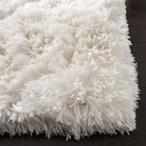 Indulge in the deep plush texture of Arctic Shag from SAFAVIEH, a Flokati style hand-tufted rug evoking the look of high mountain sheepskin. Shag Rug Bedroom, White Fluffy Rug, Throw Rugs Bedroom, White Shag Rug, Faux Fur Area Rug, Shag Carpet, High Mountain, Solid Color Rug, Fluffy Rug