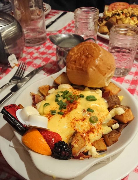 Best restaurants in Banff, Canada-Here is pictured my favorite dish at Tooloulou's: Breakfast Poutine, a Canadian dish with an Cajun Acadian Influence. Delicious. Breakfast Poutine, Food In Canada, Canadian Foods, Canada Recipes, Canada Restaurants, Canadian Dishes, Breakfast Restaurant, Restaurant Pictures, Canada Trip