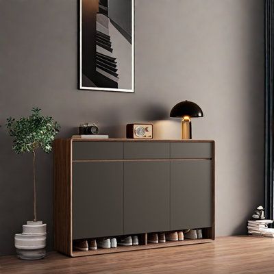 A cabinet that can be placed anywhere without being defined in multiple scenarios, suitable for any scene in the home, to meet different needs. Finish: Tan/Black | DICIXA Simple solid wood shoe cabinet 39.37 H x 47.24 W x 13.77 D in brownSolid Wood in Tan / Black | 19 | Wayfair | Organization Shoe Cabinet Design Luxury, Shoe Unit, Black Shoe Rack, Wooden Shoe Racks, Wood Shoes, Shoe Organizer, Shoe Cabinet, Shoe Storage, Black Wood